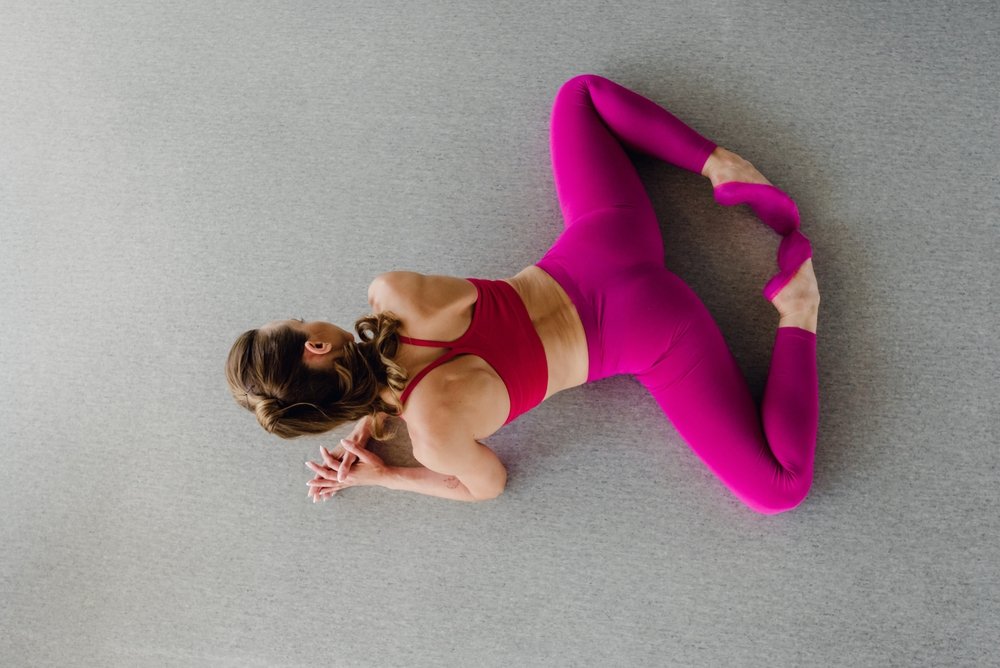 A Woman Doing Frog Pose
