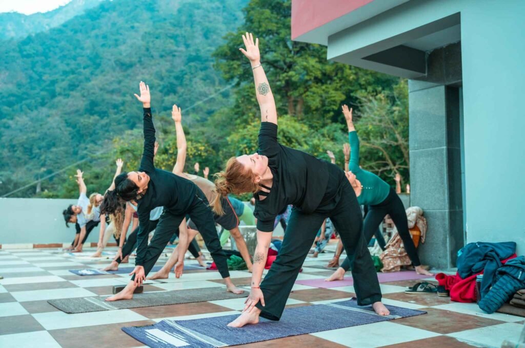 A Group of Students Practicing Trikonasana 