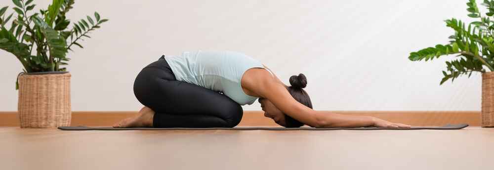Woman Practicing Balasana
