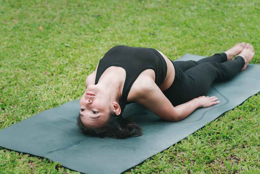 Woman Practicing Fish Pose 