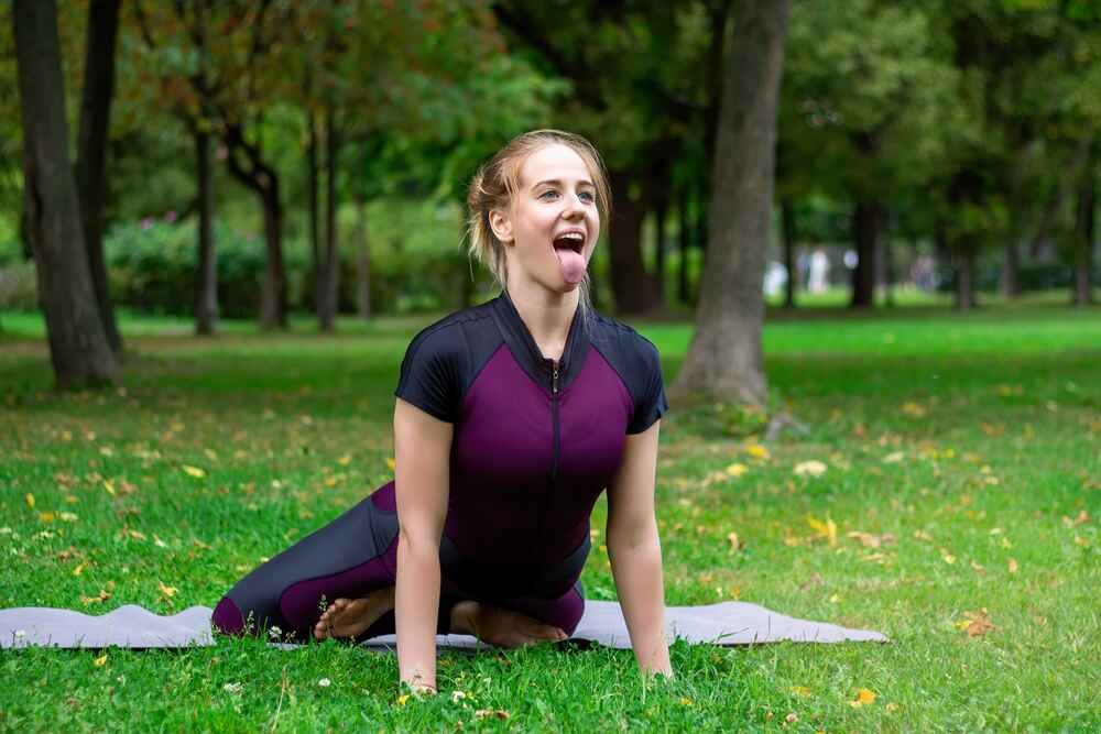 Woman Practicing Simhasana Woman Practicing Simhasana