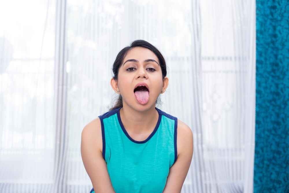 Woman Doing Lion Pose Woman Doing Lion Pose